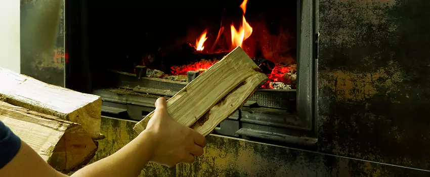Wood Stove Heat Resistant Wall Repair in West Vancouver, British Columbia