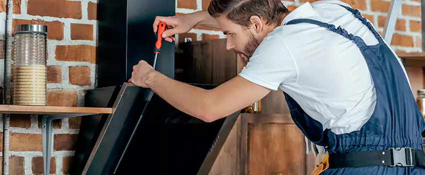 Old Rusted Metal Fireplace Repair And Replacement in West Vancouver, BC